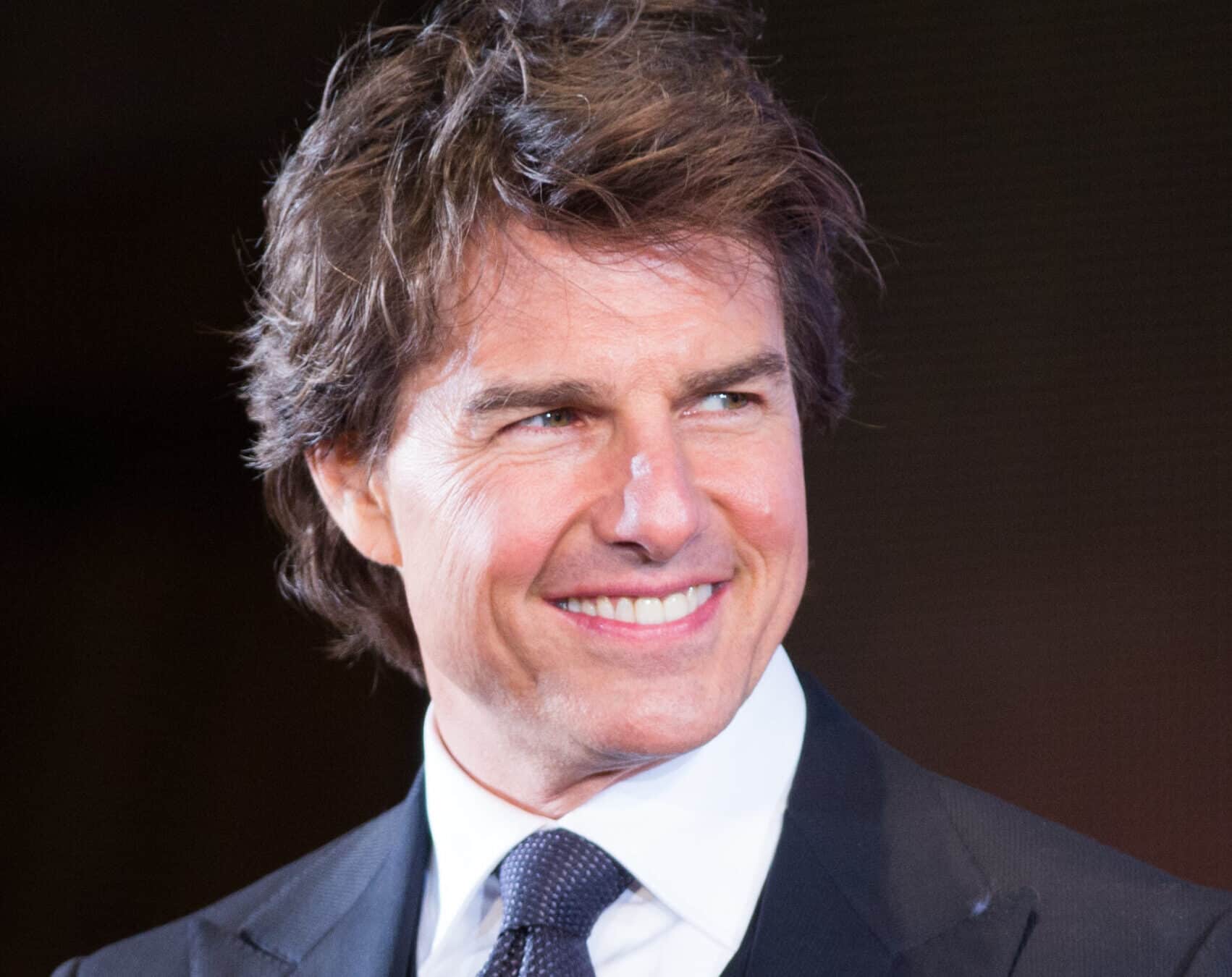 Tom Cruise wearing a suit.